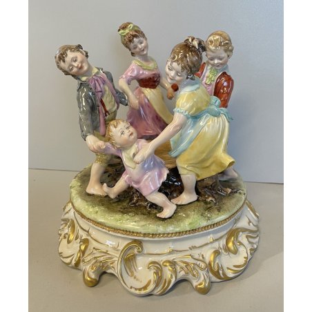 SCULTURA CERAMICA CAPODIMONTE BRUNO MERLI BAMBINI GIROTONDO FIRMATA '40/50