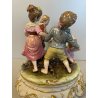 SCULTURA CERAMICA CAPODIMONTE BRUNO MERLI BAMBINI GIROTONDO FIRMATA '40/50