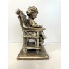SCULTURA Vincenzo Bertolotti BIMBA SEGGIOLONE GESSO PATINATO COLOR BRONZO '20