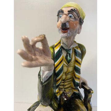 SCULTURA Cacciapuoti PORCELLANA POLICROMA FIGURA NUMISMATICO FRANCOBOLLI 34 cm/h