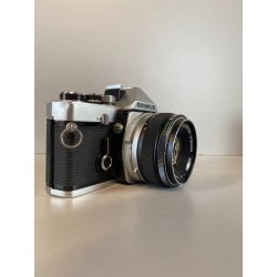 OLIMPUS OM-1 FOTOCAMERA REFLEX pellicola 35 mm NERA OBIETTIVO G.Zuiko 50 mm