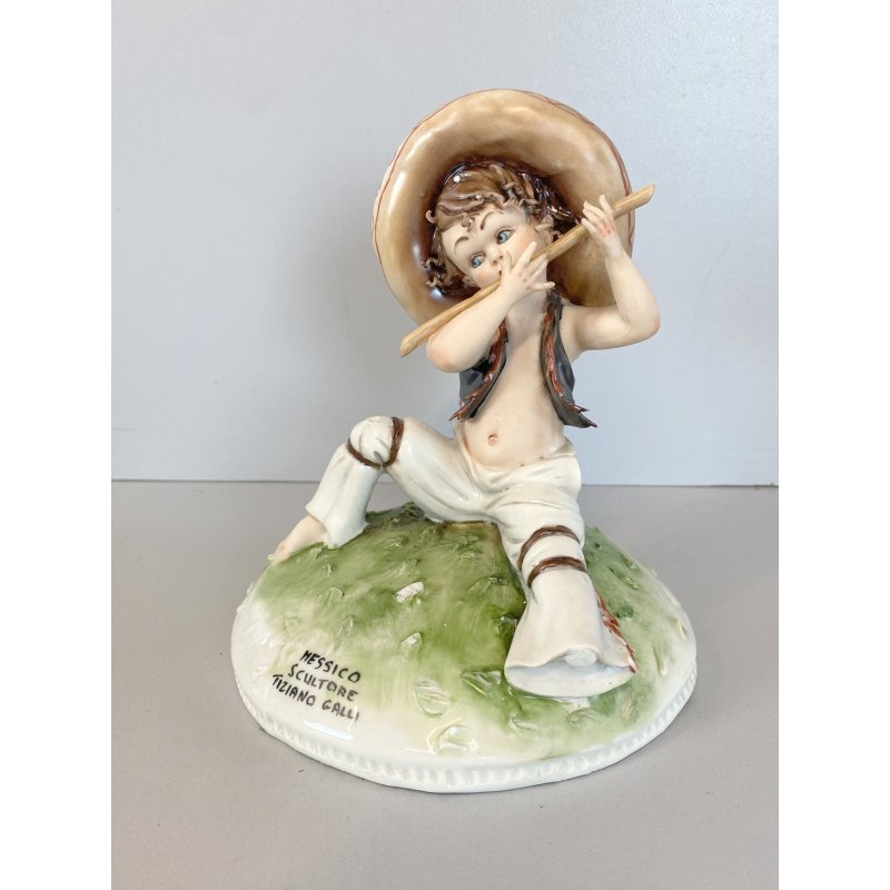 STATUINA PORCELLANA CAPODIMONTE T. Galli MESSICO BAMBINO SEDUTO con FLAUTO DANNI
