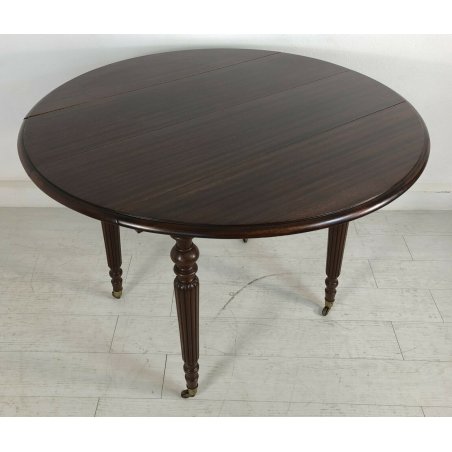 ANTICO TAVOLO ROTONDO INGLESE ALLUNGABILE MOGANO BANDELLE 1950 ROTELLE OTTONE